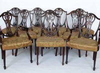 Lot 672 - Set of ten Hepplewhite style mahogany dining chairs