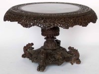 Lot 684 - Burmese carved hardwood circular centre table