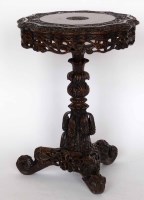 Lot 688 - A Burmese hardwood circular table