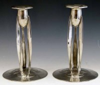 Lot 10 - Pair of Archibald Knox candlesticks