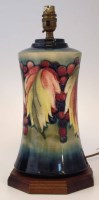 Lot 161 - Moorcroft leaves and berries pattern lamp base.