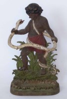Lot 408 - Cast iron snake boy stick stand.
