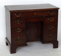 Lot 424 - George III mahogany knee-hole desk.