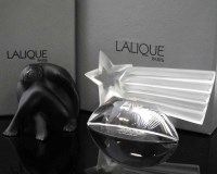 Lot 58 - Two Lalique boxed models, to include seated nude