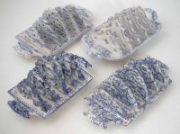 Lot 197 - Four 19th century blue transfer toast racks
