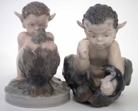 Lot 237 - Two Royal Copenhagen Fauns, modelled with pet