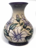 Lot 250 - Moorcroft trail vase, decorated with Hibiscus Moon pattern