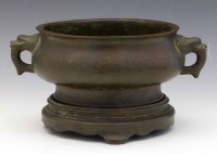 Lot 303 - Chinese bronze censer and stand 18th century.