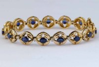 Lot 335 - Sapphire and diamond bracelet.