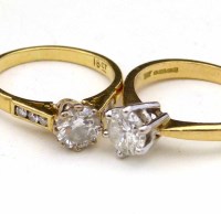 Lot 355 - Two 18ct single stone diamond rings, approx 1.0ct