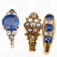 Lot 365 - Three antique gold gem set rings.