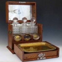 Lot 33 - Late Victorian oak table-top liqueur cabinet.