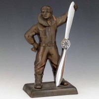 Lot 39 - Table lighter in the form of an Airman.