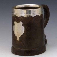 Lot 41 - Silver mounted leather jack.