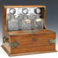Lot 42 - Victorian oak tantalus.
