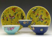 Lot 284 - Pair of yellow ground bowls and three others.