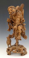 Lot 308 - Chinese hardwood imortal.