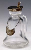 Lot 397 - Silver and glass individual  Whiskey jug with