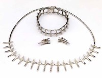 Lot 421 - 14k white gold necklace, bracelet and earrings.