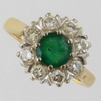 Lot 434 - Emerald and diamond ring.