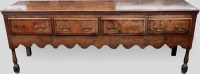 Lot 712 - George III oak dresser.