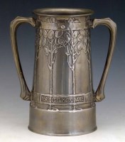 Lot 3 - Tudric pewter For old times sake vase.