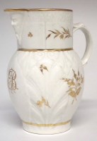 Lot 103 - Small Caughley mask jug circa 1790 monogrammed