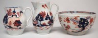 Lot 138 - Two Lowestoft creamjugs and a bowl circa 1780