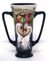 Lot 244 - Boxed Moorcroft twin handle vase.