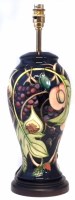 Lot 260 - Moorcroft lamp base, decorated with Queen's