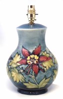Lot 265 - Moorcroft lamp base, decorated with columbine