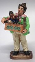 Lot 313 - Royal Doulton figure of the Organ Grinder, HN.