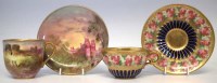 Lot 135 - Two Royal Doulton miniature cups and saucers.