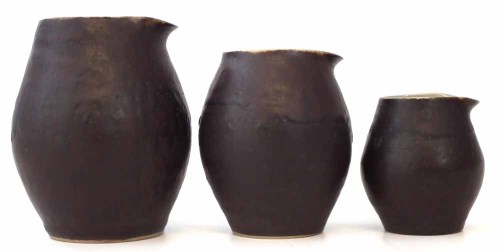 213 - Three Lucie Rie jugs.