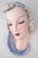 Lot 223 - Goldscheider lady wall plaque.