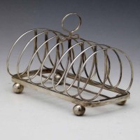 Lot 250 - Geo III silver toast rack, Exeter 1822, Wm Woodman