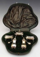 Lot 258 - Silver condiment set.