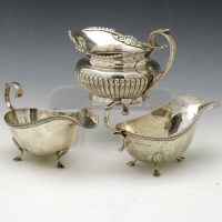 Lot 269 - Three silver sauceboats.