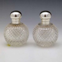 Lot 272 - Pair of cut glass globular bottles.