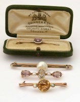 Lot 323 - 9ct gold diamond and enamel bar brooch; yellow