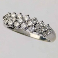 Lot 341 - 14k gold w/g diamond ring.