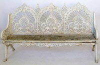 Lot 571 - Cast iron garden seat.