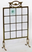 Lot 575 - Brass/glass firescreen.