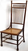 Lot 590 - William Morris style cane seated chair.