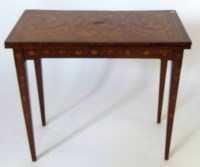 Lot 599 - Marquetry fold-over card table.