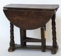 Lot 630 - 18th century oak small gate leg table.