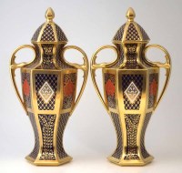 Lot 90 - Pair of Caverswall lidded vases.