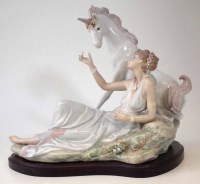 Lot 115 - Lladro Unicorn figure group.