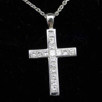 Lot 178 - Platinum and princess diamond cross on chain