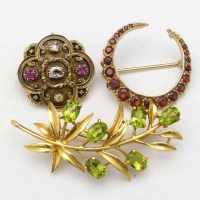 Lot 195 - 9ct gold peridot leaf spray brooch; antique ruby